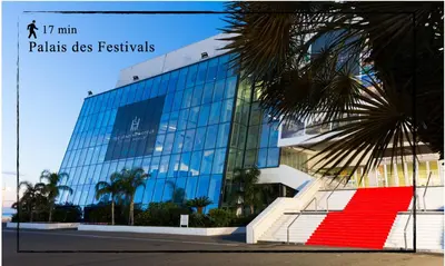 a glass building with a red rug in front of it at Suite Jam - Superbe Appartement à Cannes in Cannes