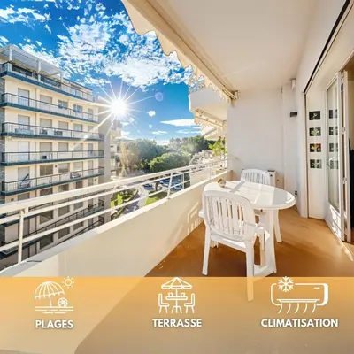 a balcony of a building with a table and chairs at FRGK 