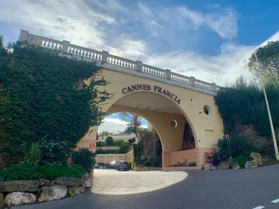 an entrance to a building with an archway at Cannes Villa Francia in Cannes