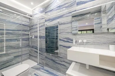 a bathroom with a white toilet and a sink at Luxurious Villa with heated pool 6BR-12p - Cannes in Cannes