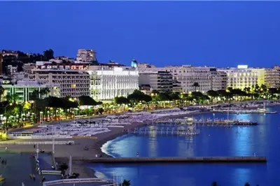 a view of a city with a beach and buildings at Wonderful studio heart of Cannes!! in Cannes