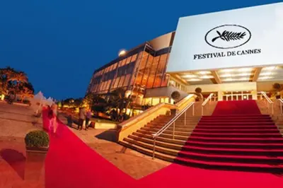 a red carpeted staircase in front of a building at Wonderful studio heart of Cannes!! in Cannes