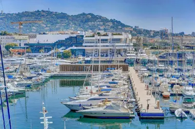 a bunch of boats docked in a harbor at 2 Room modern, terrace and Parking in Cannes