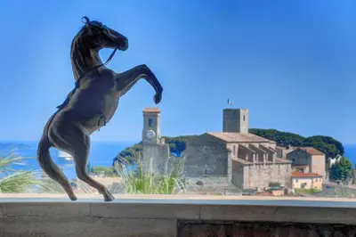 a statue of a horse on top of a wall at Deluxe 2 bedroom apartment in Cannes