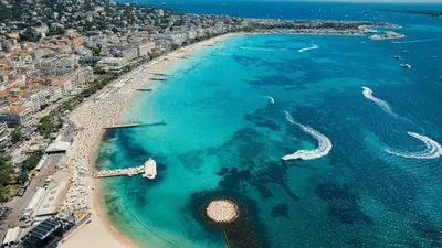 an aerial view of a beach and the ocean at 4A - APARTMENT FACING PORT & Town Hall in Cannes