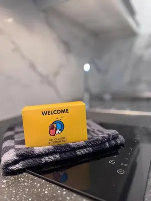 a yellow sign sitting on top of a counter at Serenity in Cannes