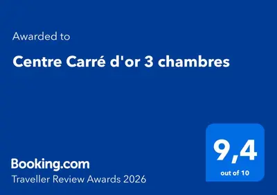 a bedroom with a bed and a shower curtain at Centre Carré d'or 3 chambres in Cannes