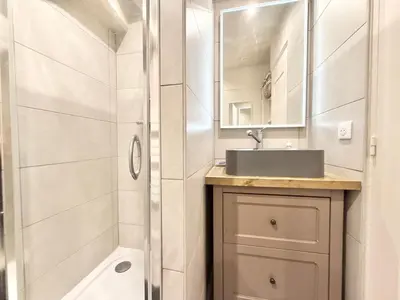 a bathroom with a sink and a shower at Elegant studio in Cannes - Le Suquet - 2 people in Cannes