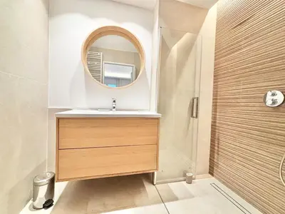 a bathroom with a sink and a mirror at Cannes - 2 bedrooms & 2 bathrooms apartment - 24P1 in Cannes