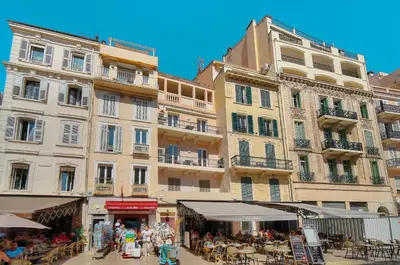 a group of people sitting in front of a building at DUPLEX 2 chambres -TERRASSE Vue MER-FELIX FAURE A2B024 in Cannes
