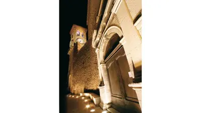 a building with a clock on the side of it at Lemoine in Cannes