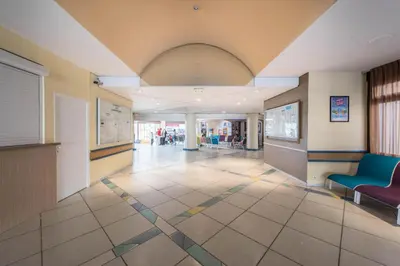 a hallway of a hospital with a waiting room at Résidence Cannes Verrerie - maeva Home - Studio 5 personnes Selection MAE-7337 in Cannes