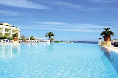 a large pool with blue water in front of a building at Résidence Cannes Villa Francia - maeva Home - Appartement 2 Pièces 6 Personnes - Budget MAE-6123 in Cannes