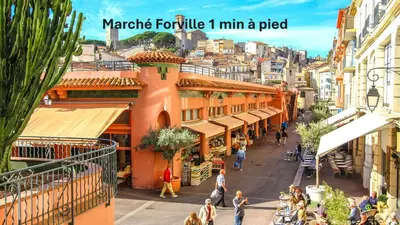a view of a street in a city with people at Charmant 2 pièces MEYNADIER-FORVILLE A1B209 in Cannes