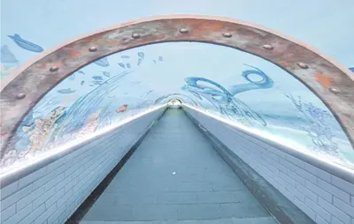 a view of a tunnel with a painting on the wall at Amazing Apartment In Cannes With Wifi in Cannes