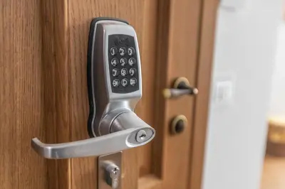 a close up of a door with a remote control at LB Vacation Rentals I Deluxe Studio w Balcony - 5mn Center I Casa d'Azur in Cannes