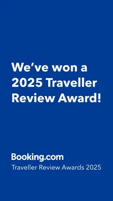 a blue sign that says weve won a traveler review award at Proche Carlton & Croisette, Appartement 103 in Cannes