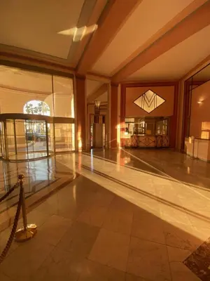 a empty lobby with a dance floor in a building at Palais Miramar - Suite Blue Room - Vue Mer -Croisette Emplacement Unique - 20M Plage - WIFI - Clim in Cannes
