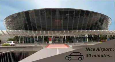a building with a car parked in front of it at 2 Chambre L - Ascenseur - Proche palais - Calme in Cannes