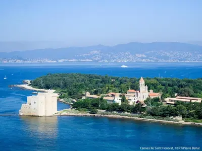 an island with a castle in the water at Apartment Le Marlyne 2-3 by Interhome in Cannes
