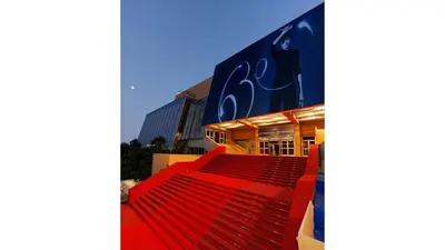 a red escalator in front of a building at Preyre 14 in Cannes